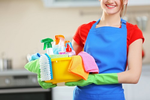 Technician using protective equipment while handling carpet cleaning products